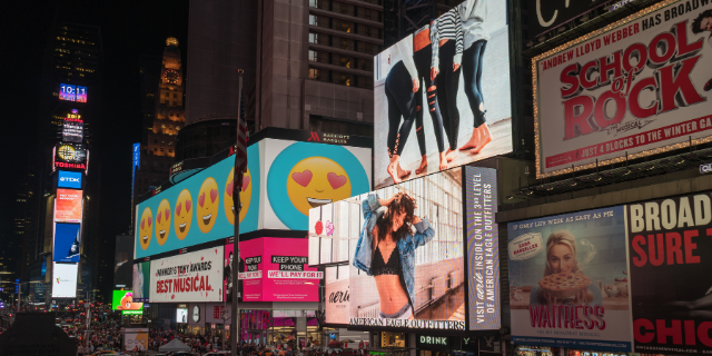 billboards on busy night street